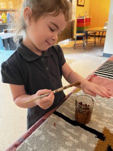 Josie comparing paint
